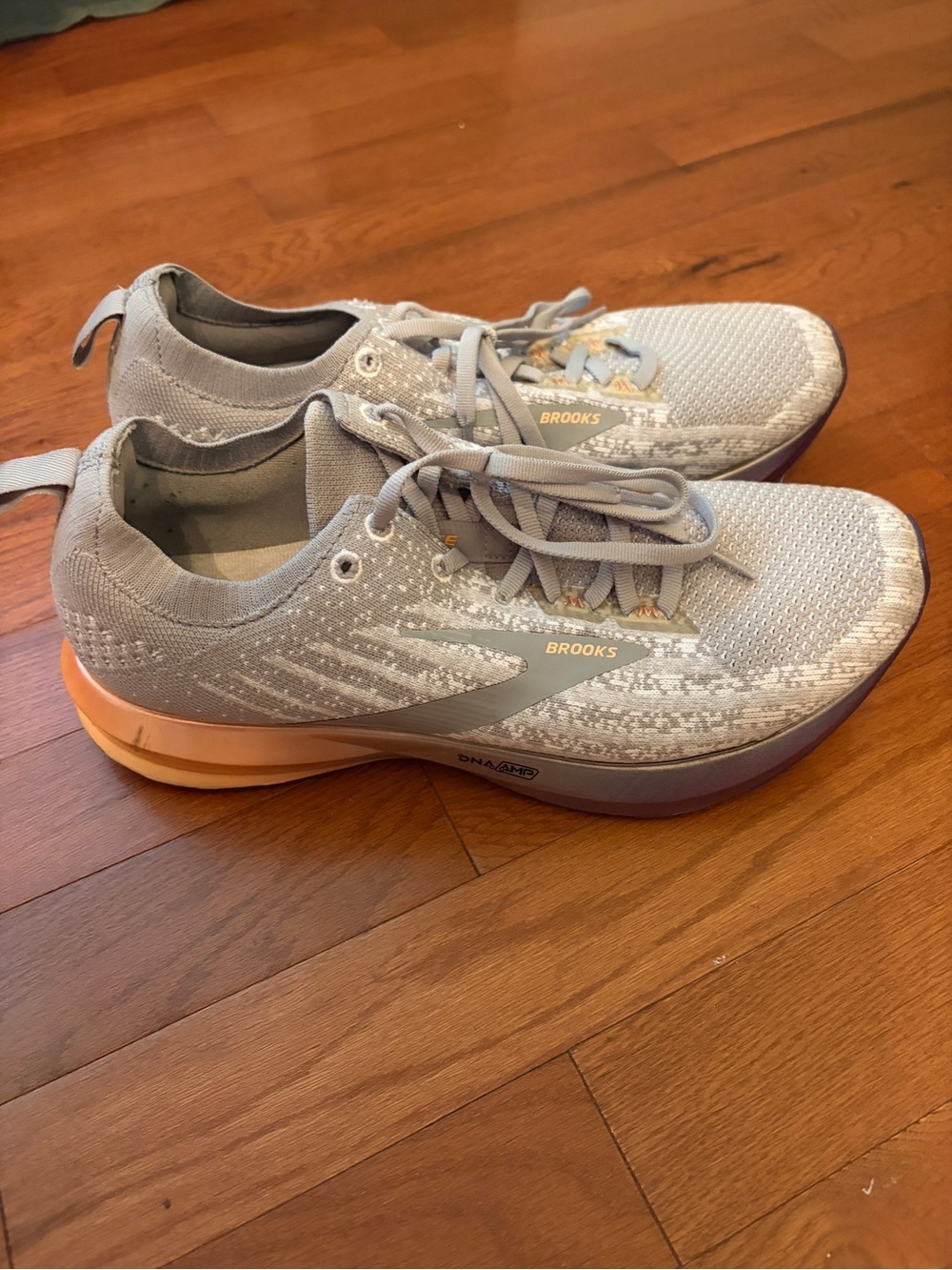 Brooks Women's Light Gray Running Shoes with Peach Sole Accent
